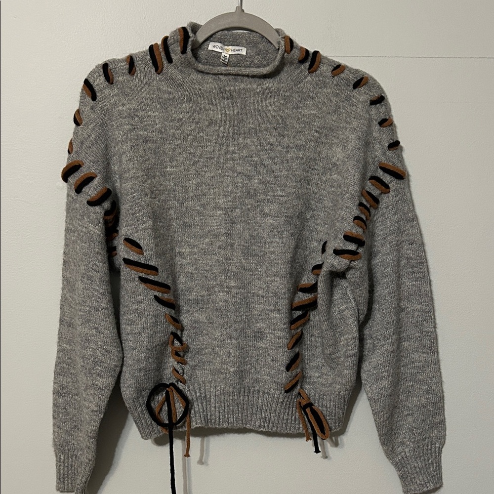 Woven Heart Gray Sweater with Brown and black lace up Details. Size: Medium NWT